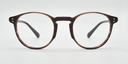 Front view round retro style glasses in brown marbled colour