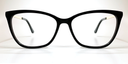 Front view. Black cat's-eye frame glasses. Gold coloured inner, black coloured outer arms.