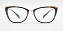 Front view. tortoiseshell cat's-eye frame showing gold coloured highlights to the top corners of the frame.