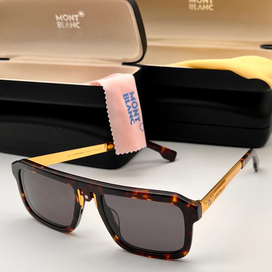 Montblanc sunglasses with a cleaning cloth and case on a white background