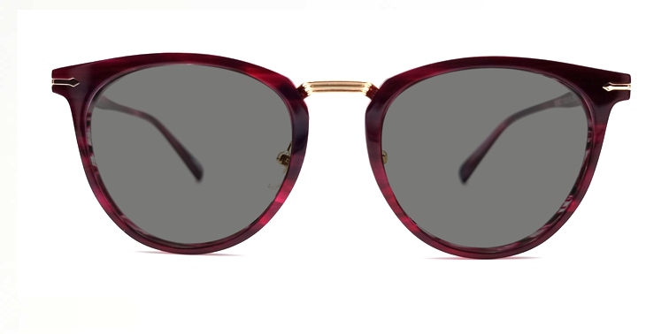 round retro style frame. front view showing gold coloured bridge and gold detail on hinges. showing tinted lenses