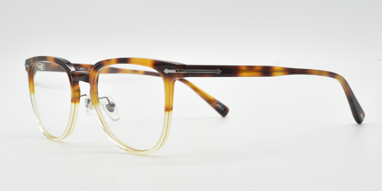 side view rounded brown tortoiseshell to clear frame glasses showing silver coloured detail on the hinge and arm