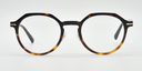 Front view octagonal tortoiseshell frame with rounded lenses and small gold detail close to hinges