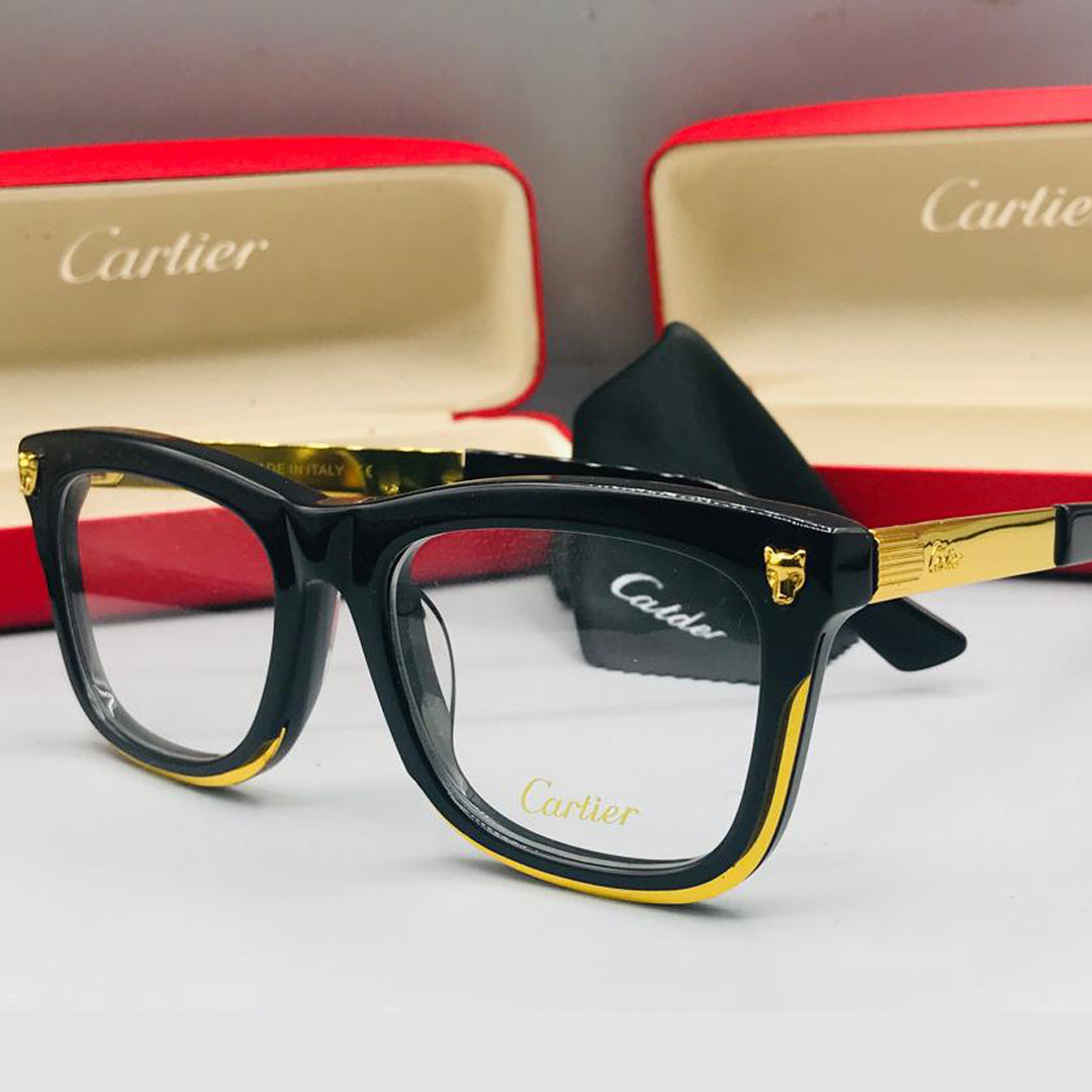 Cartier eyeglasses with black and gold frame on a white background