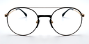 front view of Round, retro-style glasses. Prescription glasses. Black/gold colour. Black bridge with gold coloured arms
