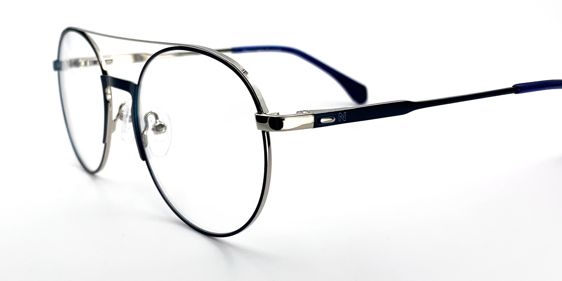 side view of Round, retro-style glasses.  blue colour with silver rims and hinges 