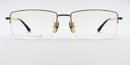 gold coloured rectangular titanium half frame. Front view showing gold coloured bridge 
