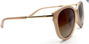 side view. Stylish semi-cat eye glasses  in light brown with tinted glasses. gold coloured features