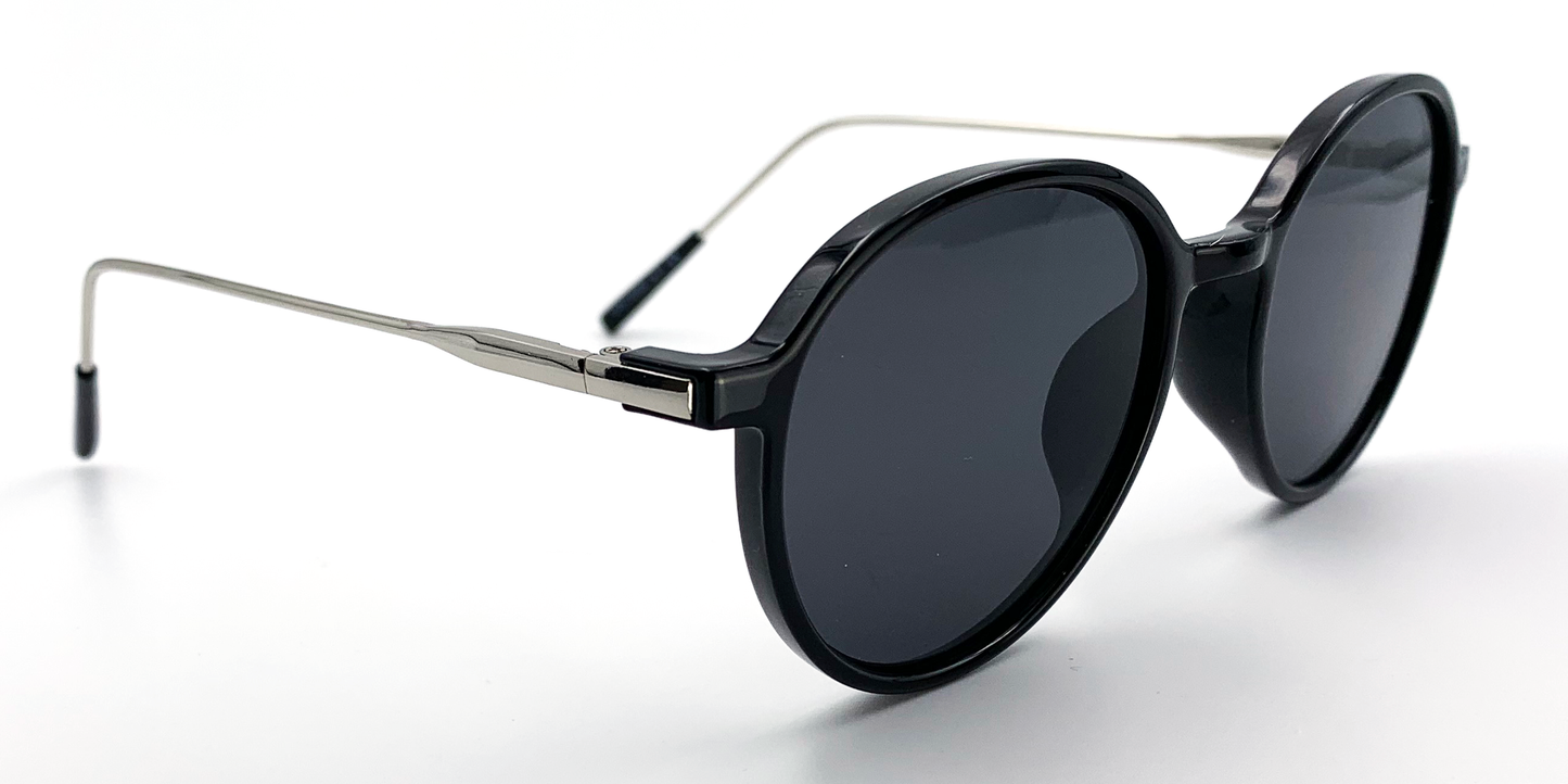 black round glasses. Side view with tinted lenses showing silver coloured arms