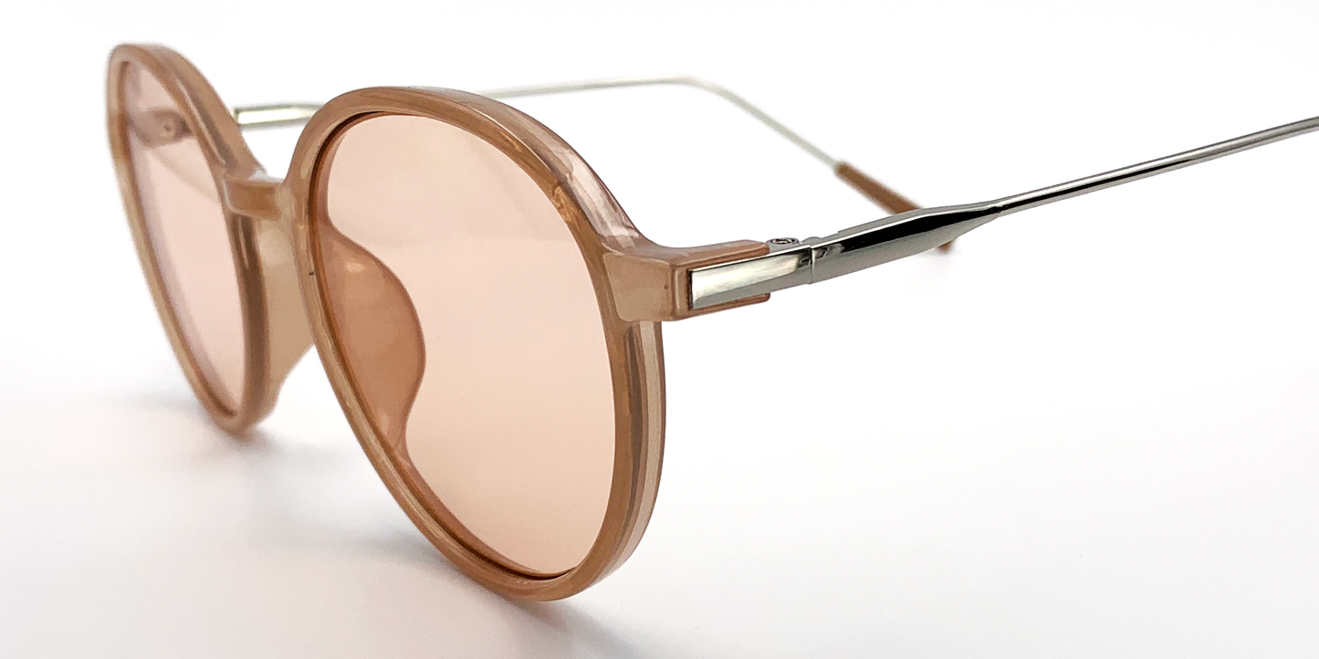 light brown round glasses. Side view with tinted lenses showing silver coloured arms