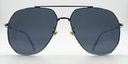 Aviator style glasses. silver colour rims, bridge and arms. Front view with blue tinted lenses.