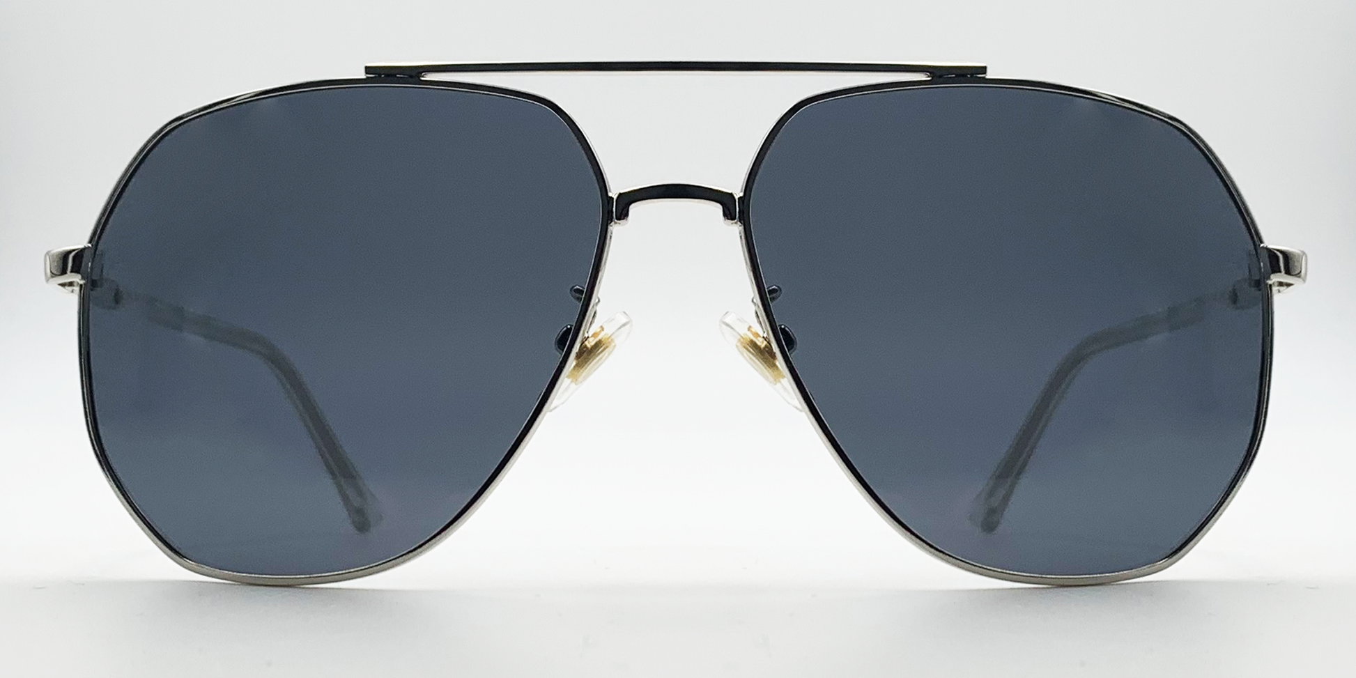 Aviator style glasses. silver colour rims, bridge and arms. Front view with blue tinted lenses.