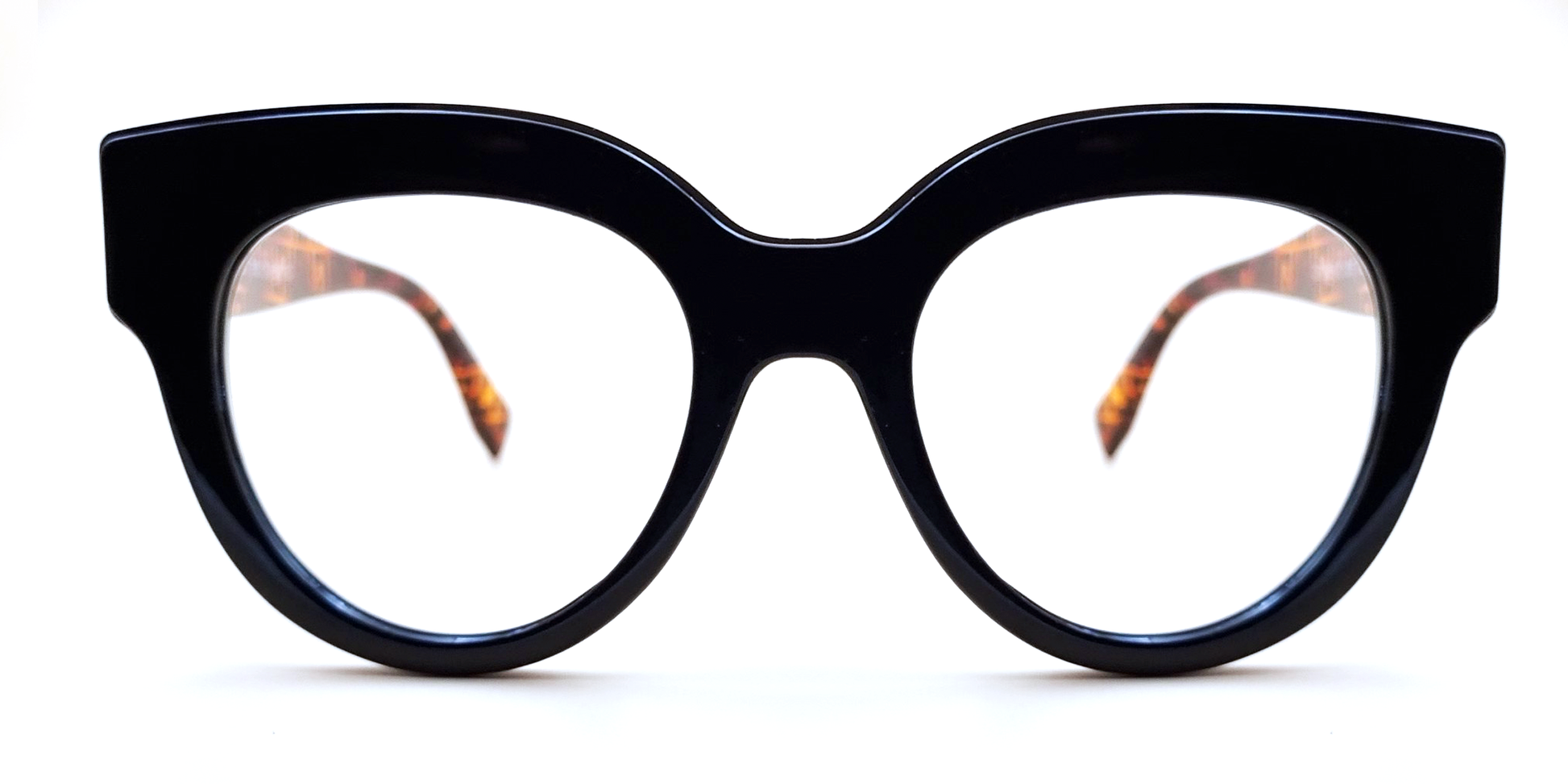 Large moulded, all-in-one, black frame glasses housing round lens. Front view 