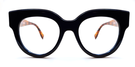 Large moulded, all-in-one, black frame glasses housing round lens. Front view 