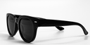black curved square frame glasses with very dark lenses, side view showing small silver colour detail close to the hinges. All black arms. All-in-one acetate frame.