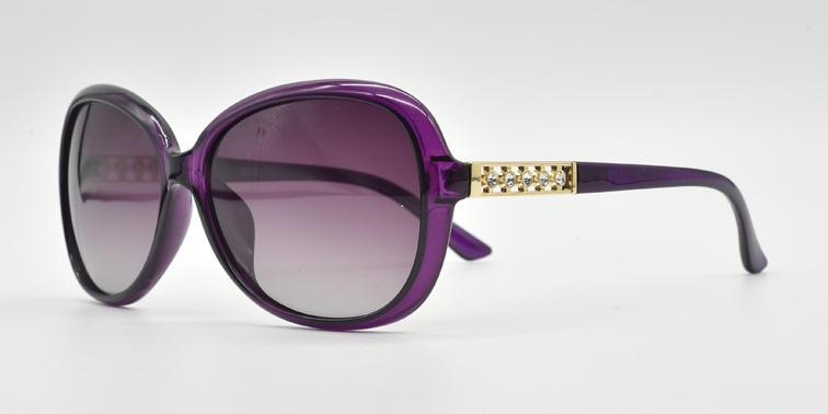 side view, large rounded rectangular purple frame with tinted lenses. gold with 5 small gemstones detail on top part of the arm.