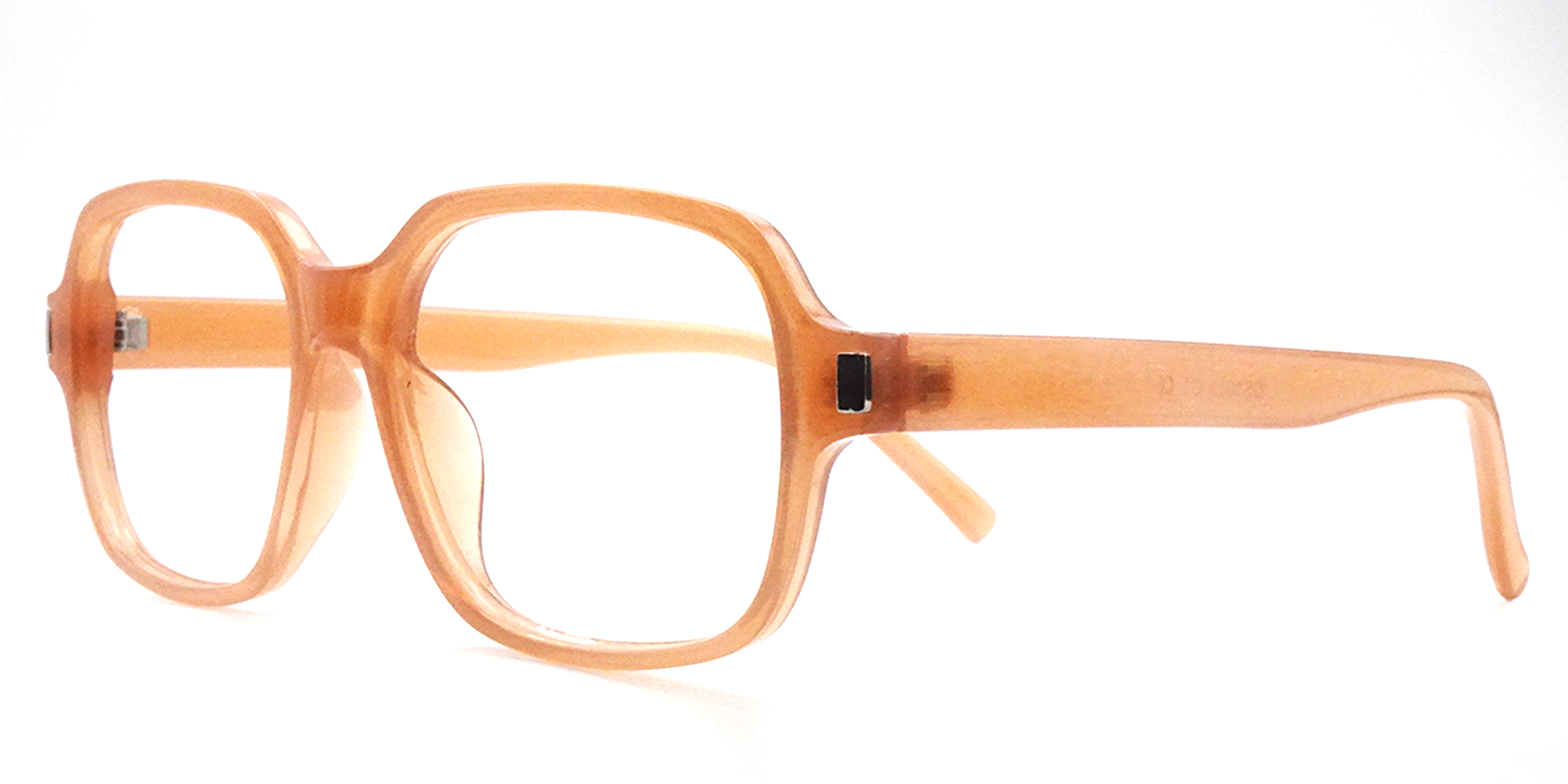 side view of light brown rounded rectangular frame. all one colour including arms. 