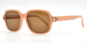 side view of light brown rounded rectangular frame. all one colour including arms. showing tinted lenses