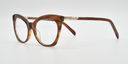 Front/side facing brown cat's eye frame showing zig-zag crystal detail on the arm