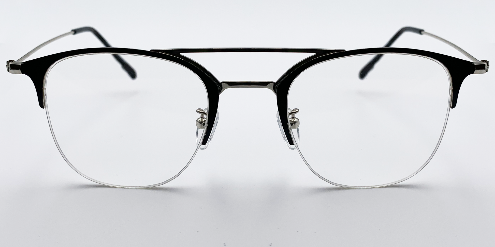 front view round half rimless glasses. Black with silver bridge and hinge accents. 