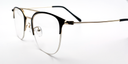 Side view round half rimless glasses. Black with gold coloured bridge hinges and arms. 