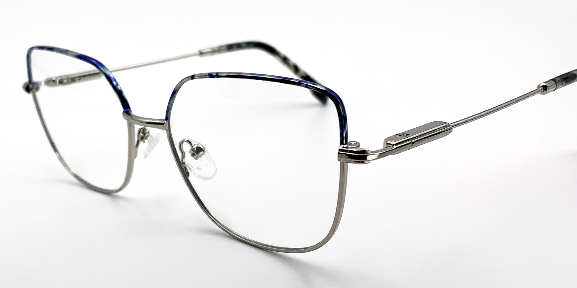 side view delicate metal frame. multi colour top of frame and silver colour rest of frame.