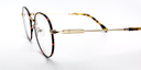 side view delicate round metal frame. tortoiseshell  colour, gold colour bridge and arms