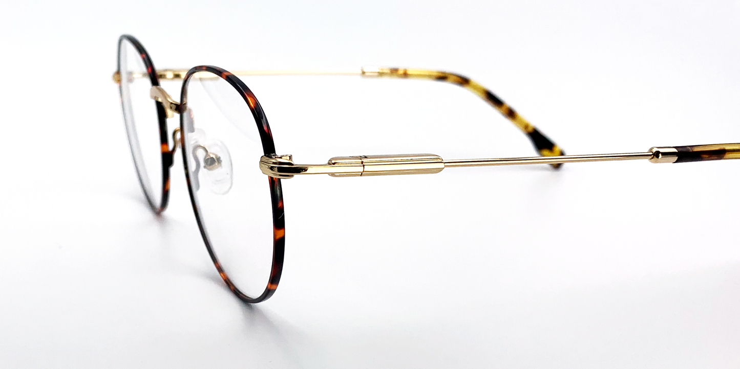 side view delicate round metal frame. tortoiseshell  colour, gold colour bridge and arms