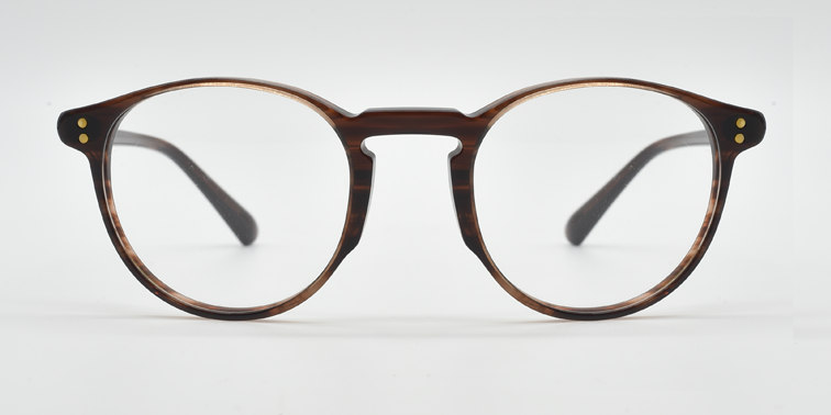 Front view round retro style glasses in brown marbled colour