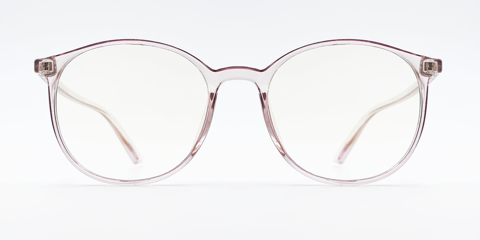 front view of clear round retro-style glasses. frame and arms same colour.