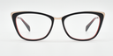 Front view. black/red cat's-eye frame showing gold coloured highlights to the top corners of the frame. 