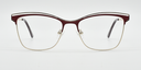 Front view of Red frame. Fine metal above creating eyebrow detail on top of the frame. Half rimless frame.