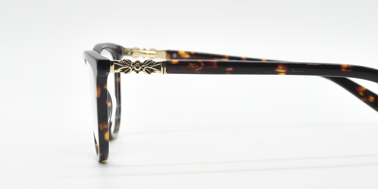 side view. Showing Gold flower detail at top of the arm