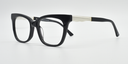 front/side view. All black rounded rectangular frame. showing white detailed arm