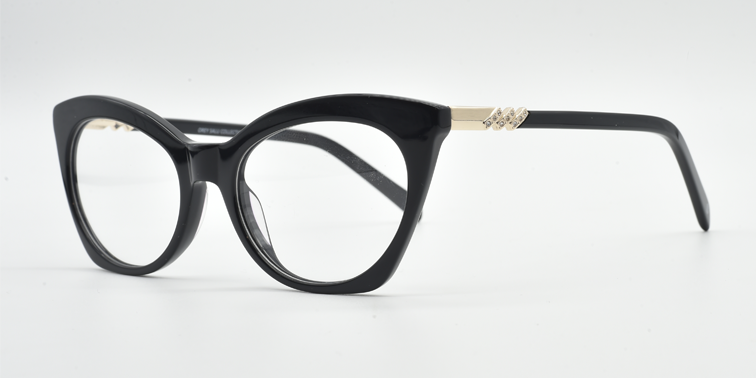 Front/side facing black cat's eye frame showing zig-zag crystal detail on the arm