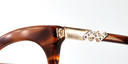close up view showing zig-zag crystal detail on the arm
