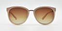 Front view. Stylish semi-cat eye glasses  in light brown with tinted glasses. Black bridge