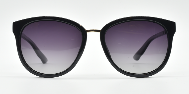 Front view. Stylish semi-cat eye glasses  in lblack with tinted glasses. Black bridge