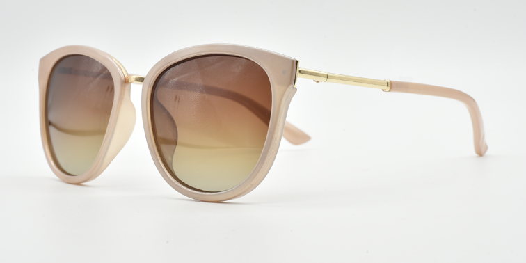 side view. Stylish semi-cat eye glasses  in light brown with tinted glasses. gold coloured features