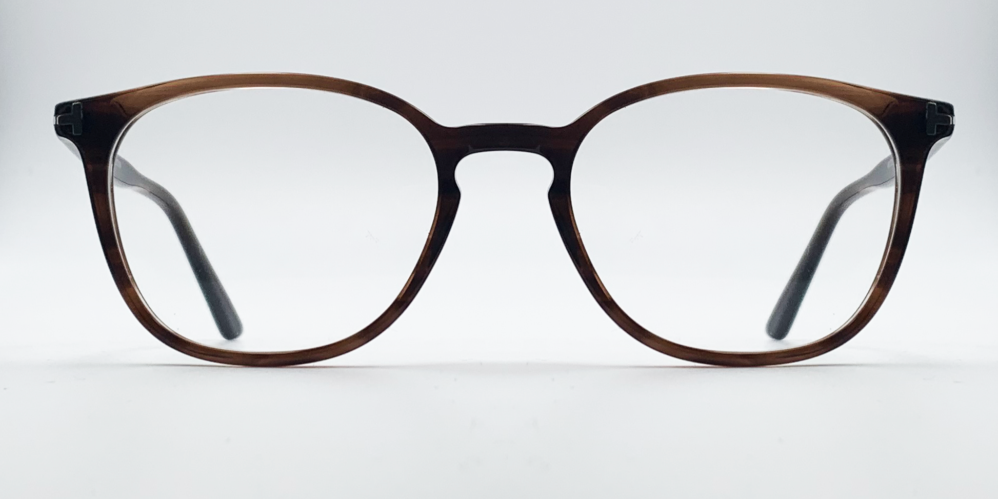 Front view rounded rectangular style glasses in brown