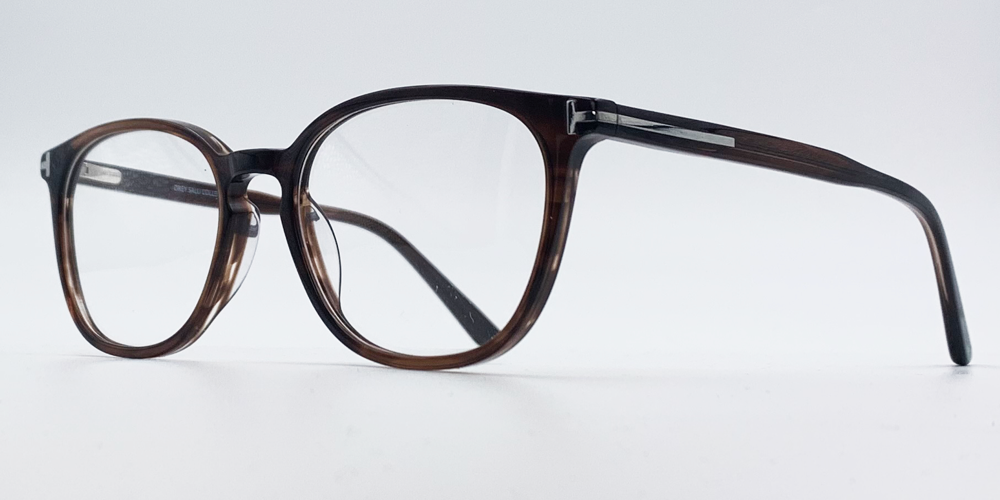 side view rounded rectangular style glasses in brown