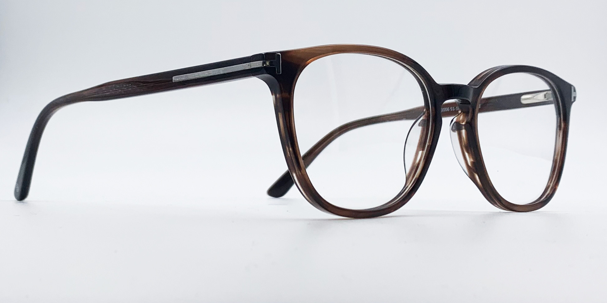 side view rounded rectangular style glasses in brown