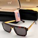 Montblanc sunglasses with a cleaning cloth and case on a white background