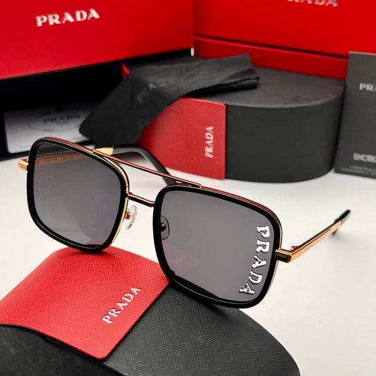 Prada sunglasses with red and black Prada packaging in the background